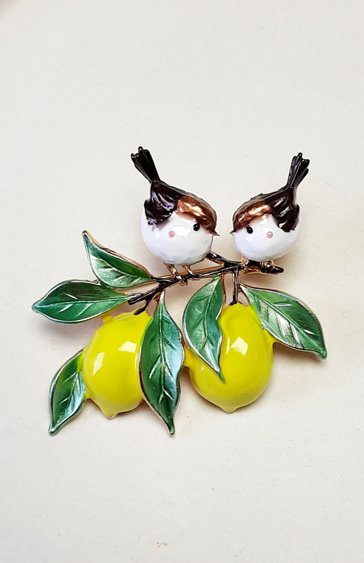 گل سینه دو پرنده